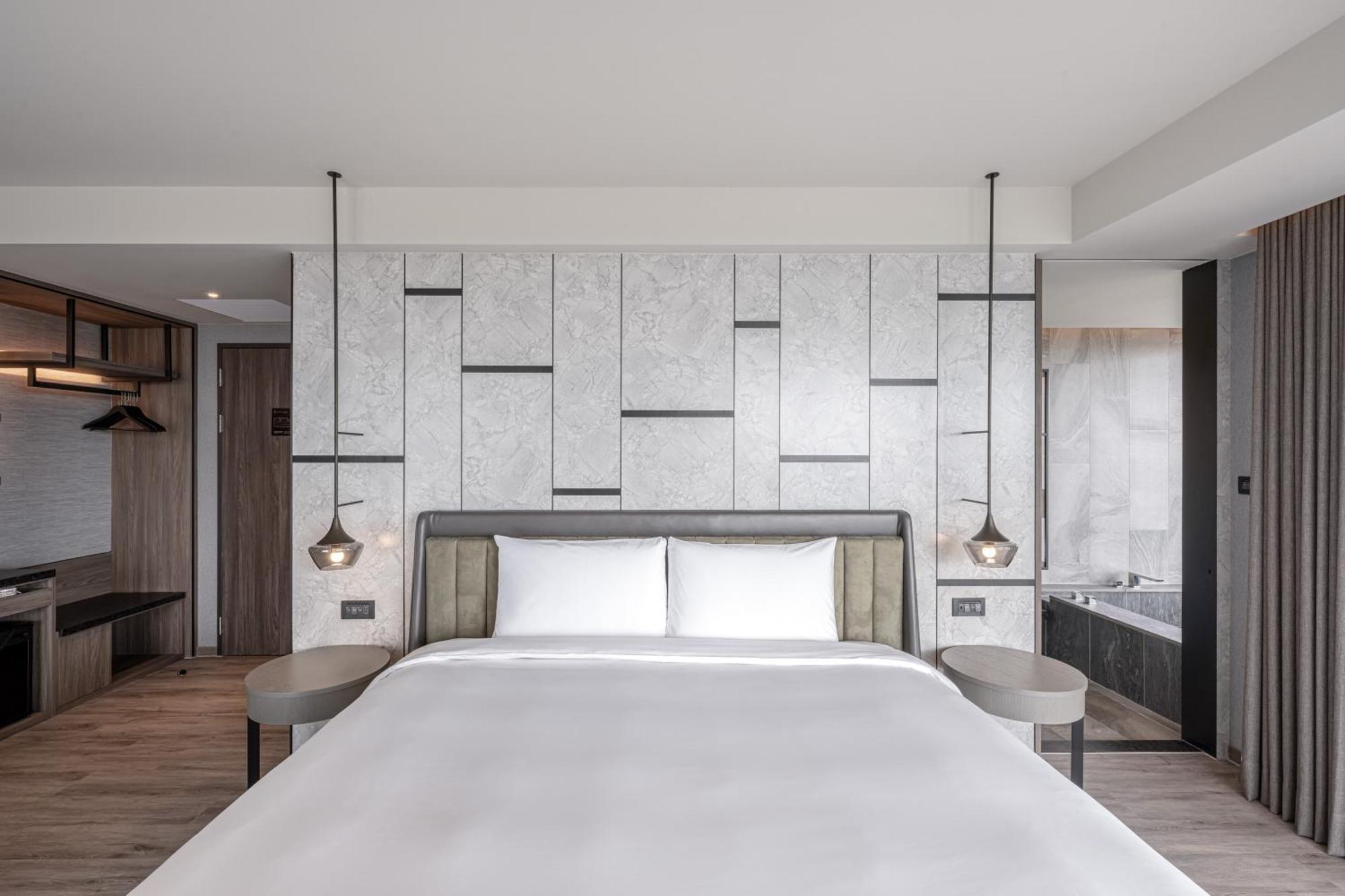 Lakeshore Hotel Hualien Taroko Shunan Camera foto A bedroom at the hotel